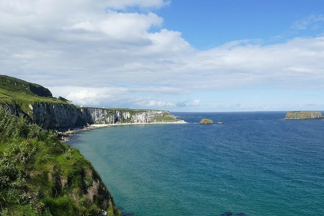 2-Day Northern Ireland Rail Tour: Belfast, Antrim Coast, and Giant's Causeway - Carrick-a-Rede Rope Bridge and Sheep Island views