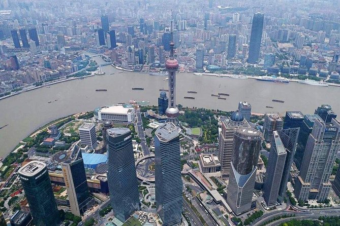 4-Hour Private Shanghai Modern Impression Tour with Tower and Maglev Train Ride - Private car, metro, and the value of $125