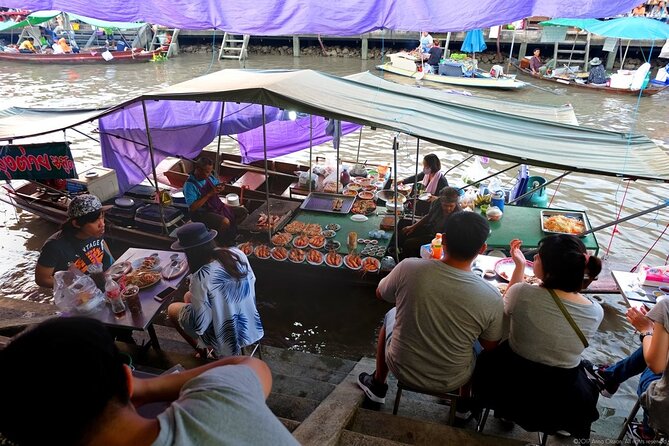 Amphawa Floating Market and Maeklong Railway Private Afternoon Tour from Hua Hin - Maeklong Railway Market and the train crossing