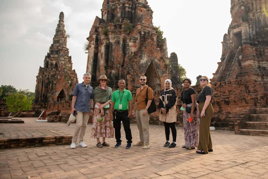 Bangkok: Ayutthaya, Railway & Floating Markets Full-Day Tour - Maeklong Railway Market: a train in the middle of shopping