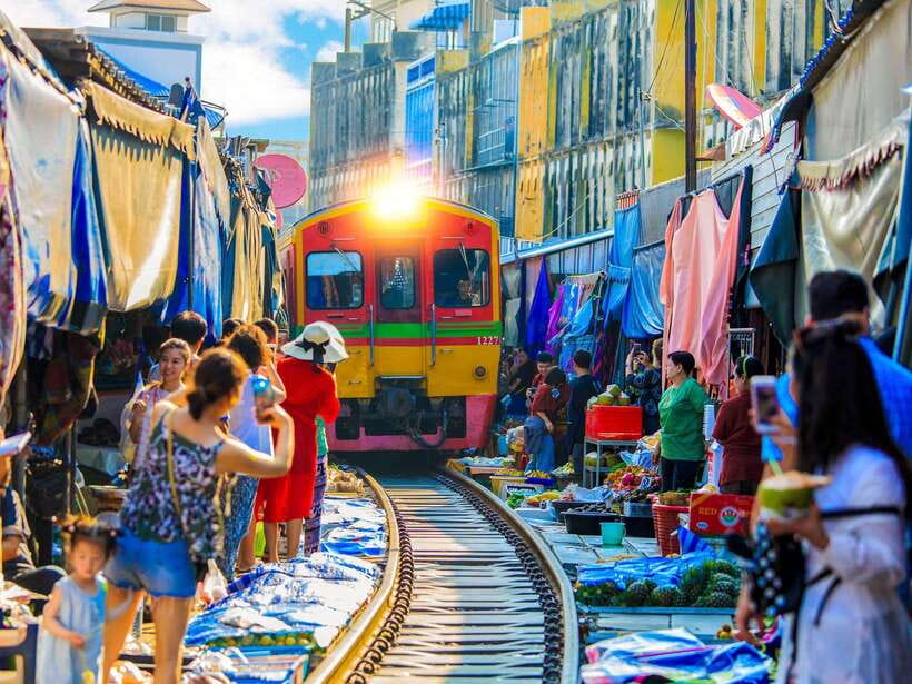 Bangkok: Maeklong Railway & Amphawa Floating Market Day Trip - Why the Maeklong Railway Market is worth the long ride