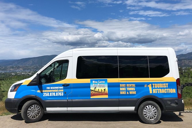 Bicyle Tour on Historical Kettle Valley Railway from Myra Canyon to Penticton - The Naramata Bench opens toward Penticton