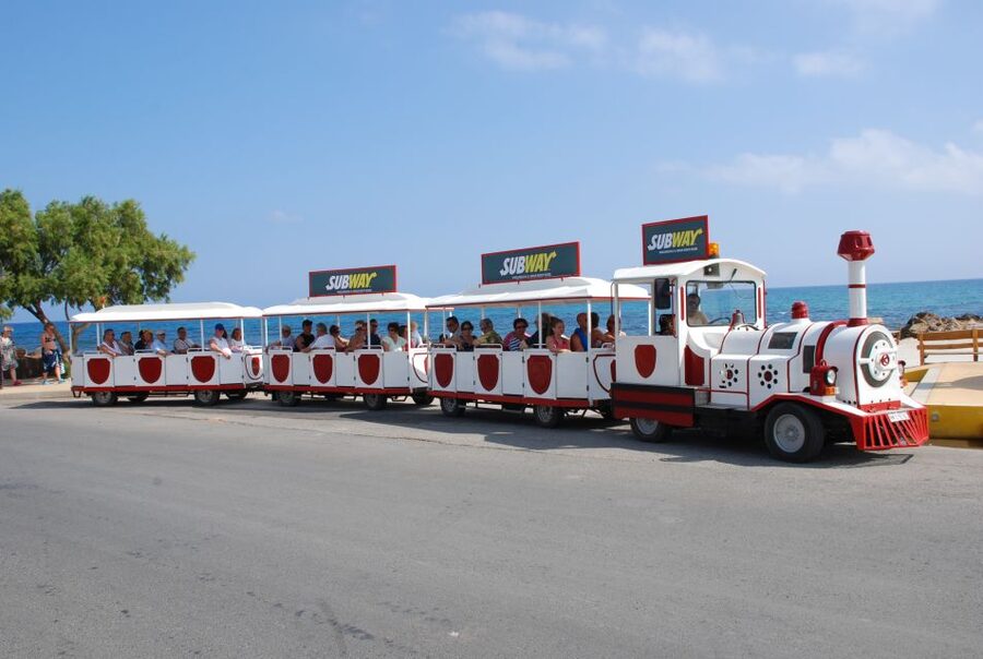 Chersonissos: Mini-Train City Highlights Tour - The port, boats, and coastal views