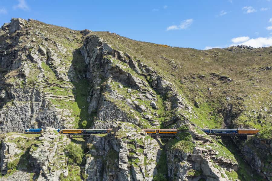 Dunedin: Scenic Railway Tour Through the Taieri Gorge - Leaving Dunedin Railway Station