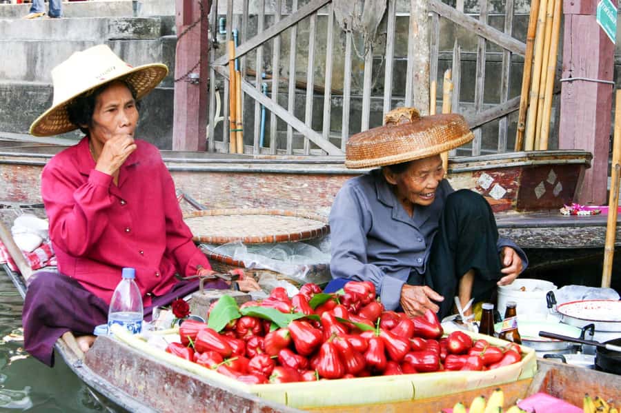 From Bangkok: Maeklong Railway and Floating Market Food Tour - What the guides add to the day