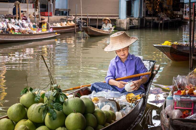 From Bangkok: Railway & Damnoen Saduak Floating Market Tour - Lao Tuk Luck and the older canal market