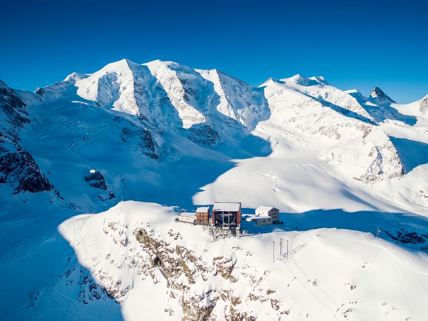 From Milan: Bernina Red Train & Lunch with Mountain Views - Riding the cable car to 2,978 meters