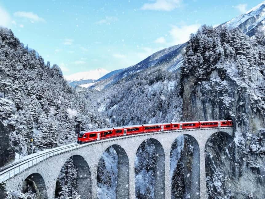 From Milan: Lake Como and Bernina Train Day Trip - Lecco gives Lake Como a calmer opening