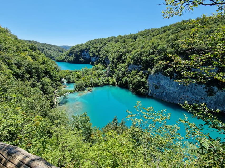 From Zadar: Plitvice Lakes Guided Tour with Boat & Train - Four hours among waterfalls and wooden paths