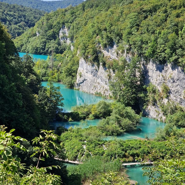 From Zadar: Plitvice Lakes Guided Tour with Boat & Train - Summer crowds, weather, and what to pack