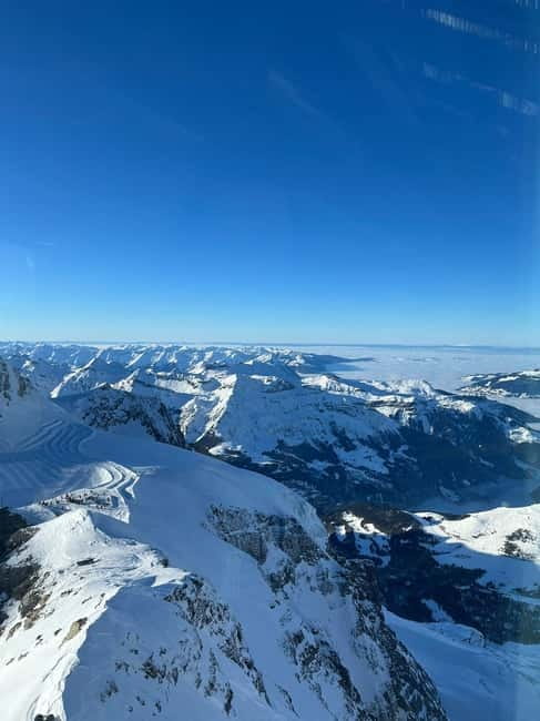 From Zurich: Jungfraujoch Day Trip with Cable Car and Train - From Zurich to Grindelwald in a private van