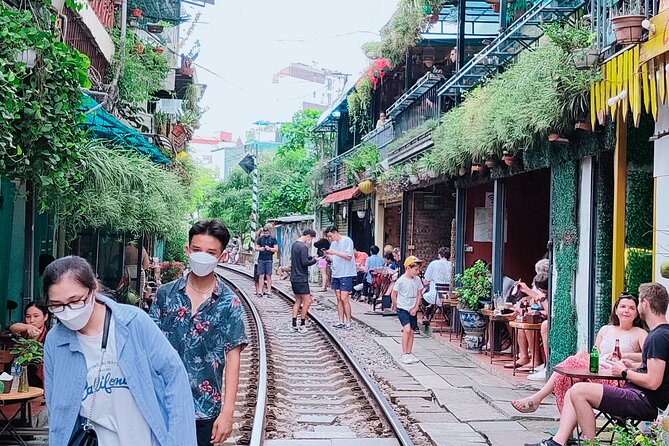 Hanoi city tour and drinking beside railway- group tour - Train Street and the railway question