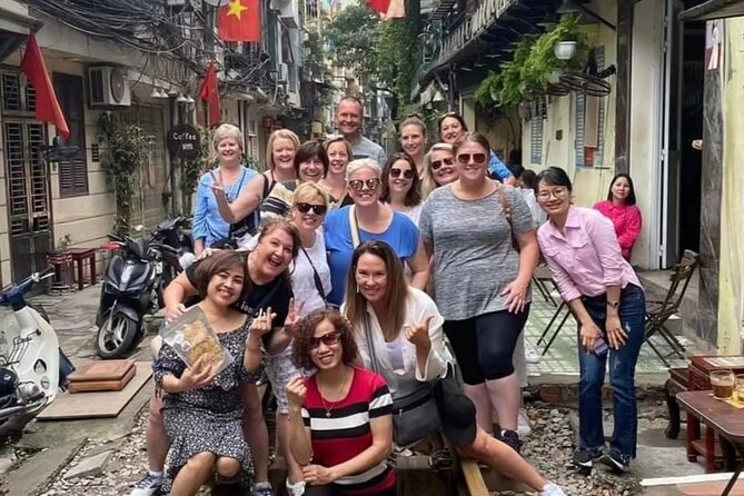 Hanoi Michelin Star Street Food Walking Tour & Train-Street - Walking through the Old Quarter and Bach Ma Temple