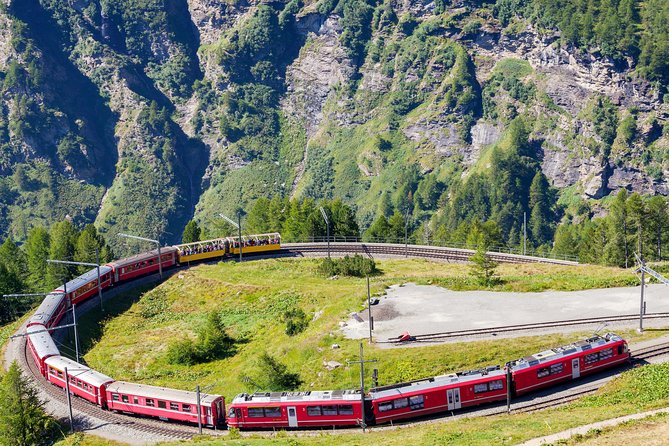 Intimate Small-Group Bernina UNESCO Scenic Train on Swiss Alps - Tirano lunch and the climb to the railway