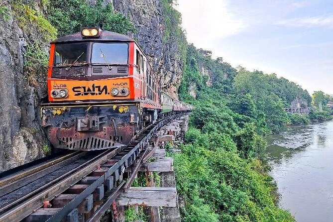 Kanchanaburi Day Trip: WWII Death Railway & Erawan Falls - Don Rak War Cemetery and the story of the railway