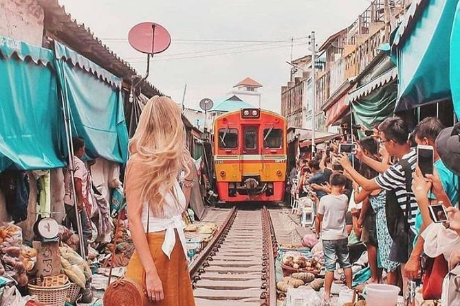 Maeklong Railway & Floating Market Tour (Private & All-Inclusive) - Damnoen Saduak by wooden boat