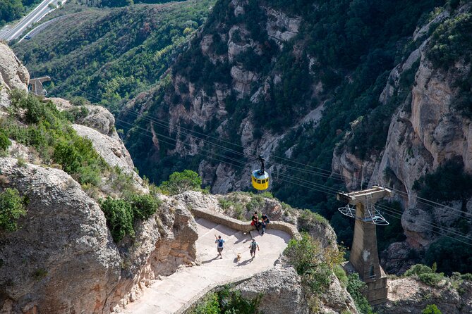Montserrat Tour with Cogwheel Train, Monastery & Black Madonna - Four local liqueurs and a taste of place