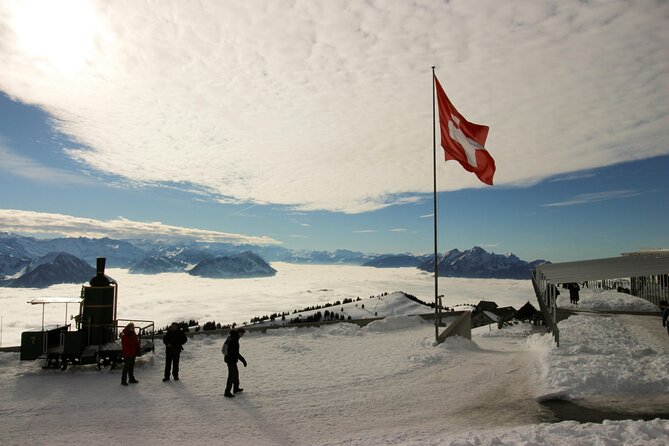 Mount Rigi Tour from Lucerne Historic Train and Boat Ride - Starting at Lucerne Station and its fire-scarred past