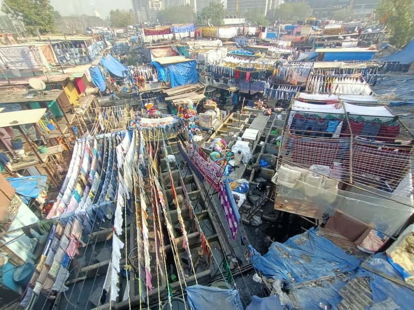 Mumbai: Dharavi Slum and Dhobi Ghat Tour with Train Ride - Starting at Third Wave Coffee