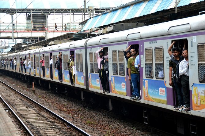 Mumbai Slum Tour with Dhobi Ghat Laundry & Train Ride Tour - Dharavi: the main two-hour visit