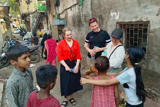 Mumbai Slum Tour with Dhobi Ghat Laundry & Train Ride Tour - Respect matters inside Dharavi