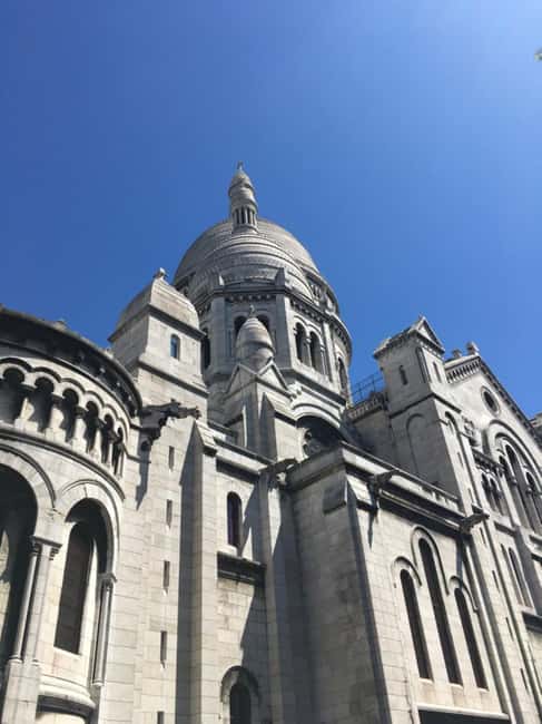 Paris: Montmartre Train Ride w/ Optional Seine River Cruise - The streets linked with artists and cabaret