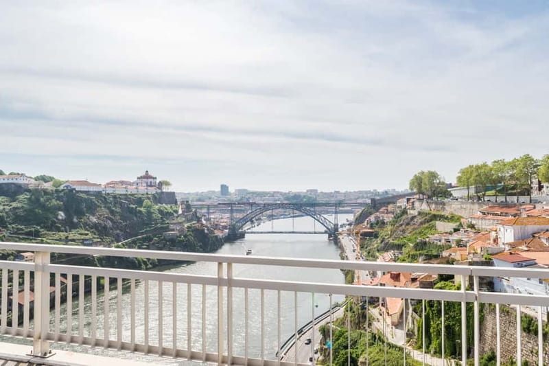 Porto: Magic Train Tour and Port Wine Cellar with Tastings - Crossing to the Port cellar