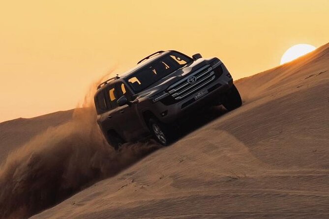 Sand Rail Dune Buggy Adventure with Sandboarding & Camel Riding - Sandboarding on Golden Slopes