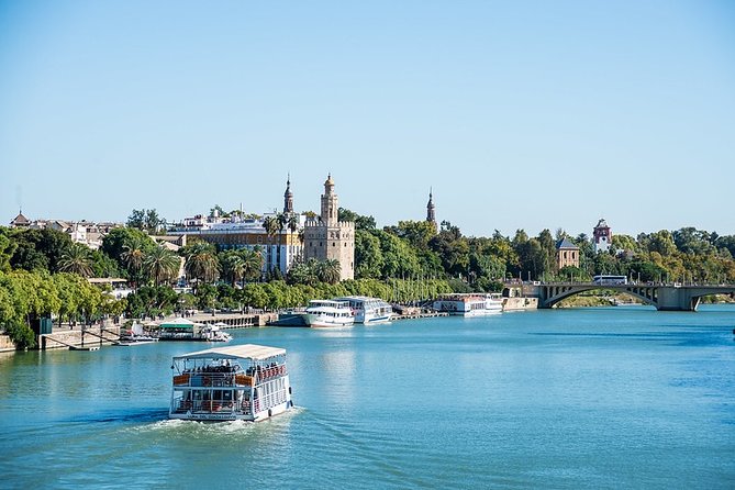 Seville Day Trip from Cordoba by High-Speed Train - The minibus view of Maria Luisa Park and Plaza de España