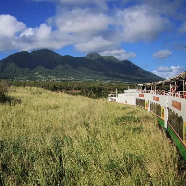 Sugar Train Tour & Drinks|Pick-Up &Drop Off From Cruise Port - Boarding a two-level train