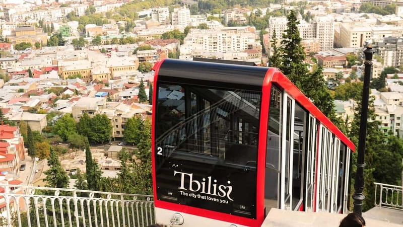 Tbilisi: Mtatsminda Park with Funicular and Cable Car Ride - Meeting the host at the Radisson Blu
