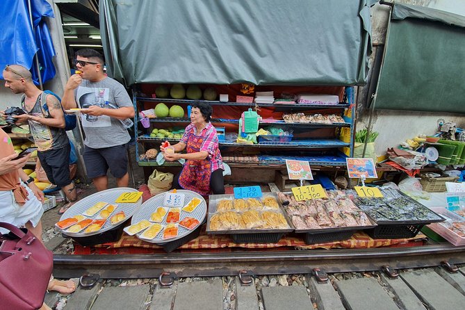 Train & Floating Market Food Adventure + Scenic train ride - The optional coconut farm adds a quieter note