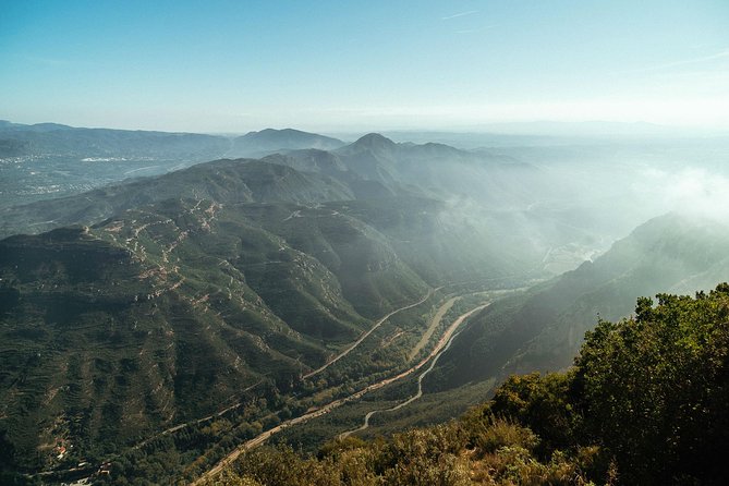 With Locals Ultimate Montserrat PRIVATE Day Trip - With Cable Car and Train - Reaching Creu de Sant Miquel