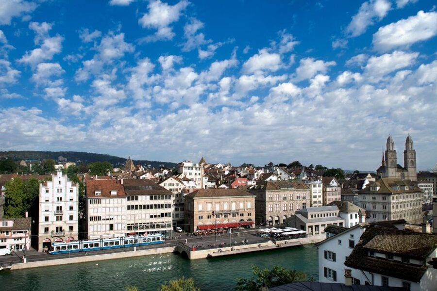 Zurich: Audio Guided City Tour and Train to “Top of Zurich” - Lake Zurich and the distant Alps
